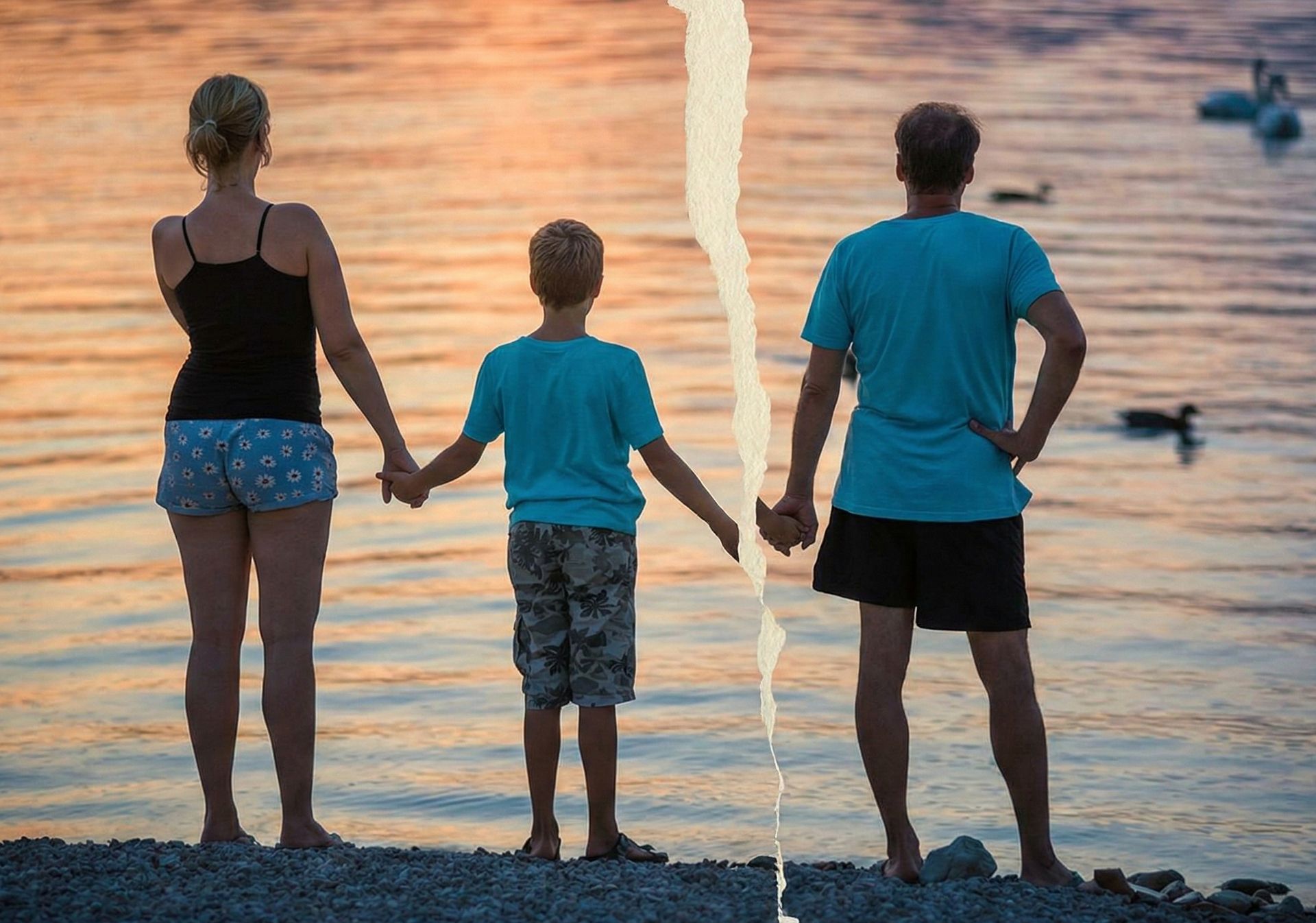 Family holding hands at sunset — torn apart by parental alienation